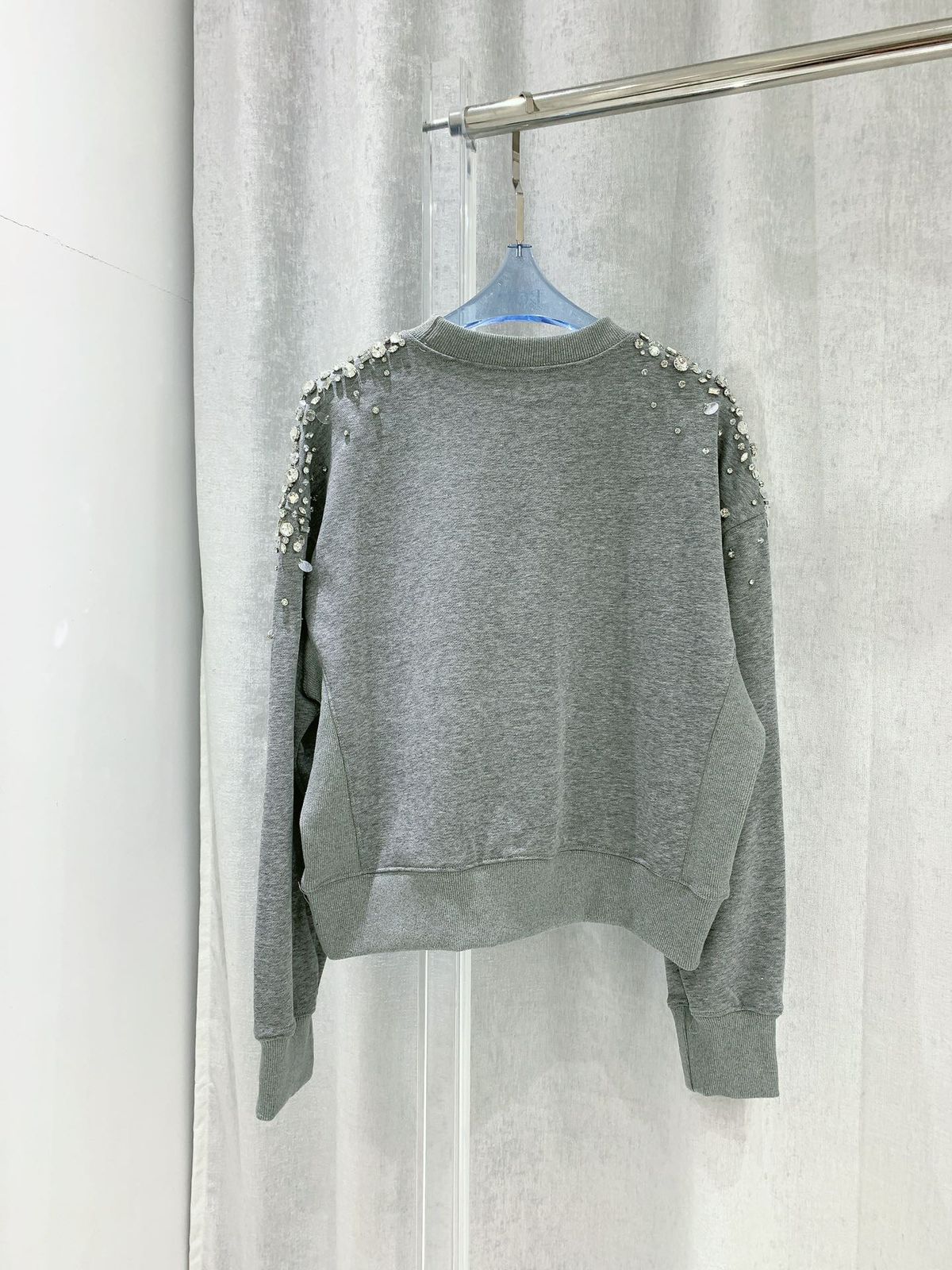 Sweatshirt Miu Miu em fleece de algodão bordado
